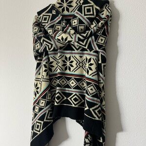 Chic Black and Cream Geometric Sweater